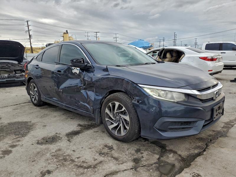 Photo 4 from auction – 2017 HONDA CIVIC EX with VIN 2HGFC2F71HH509122