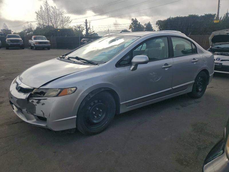 HONDA CIVIC LX 2010 with VIN 19XFA1E56AE039668 - Photo from auction