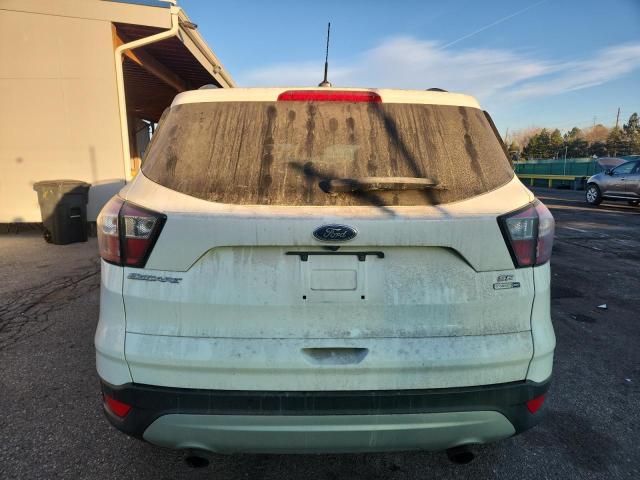 Photo 6 from auction – 2018 FORD ESCAPE SE with VIN 1FMCU9GD6JUA74186