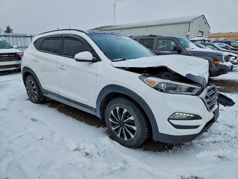 Photo 4 from auction – 2017 HYUNDAI TUCSON LIM with VIN KM8J3CA43HU418499