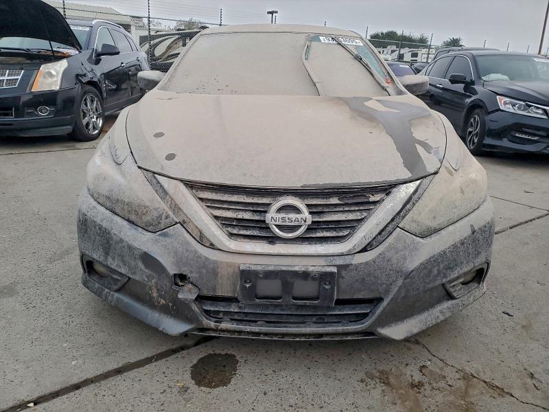Photo 5 from auction – 2016 NISSAN ALTIMA 2.5 with VIN 1N4AL3AP9GC199279