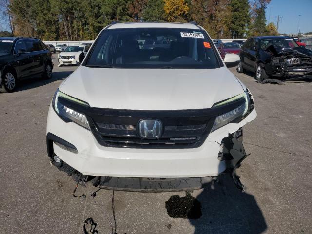 Photo 5 from auction – 2021 HONDA PILOT BLAC with VIN 5FNYF6H78MB058287