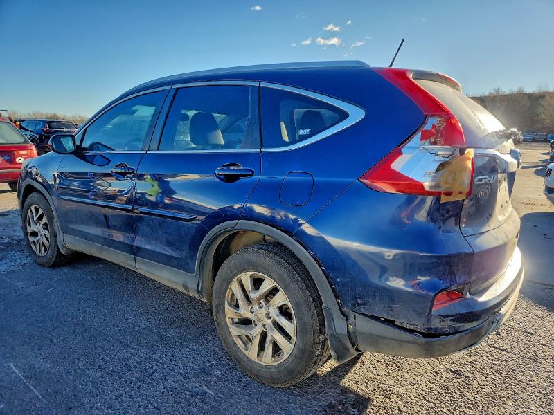 Photo 2 from auction – 2015 HONDA CR-V with VIN 2HKRM4H75FH664147