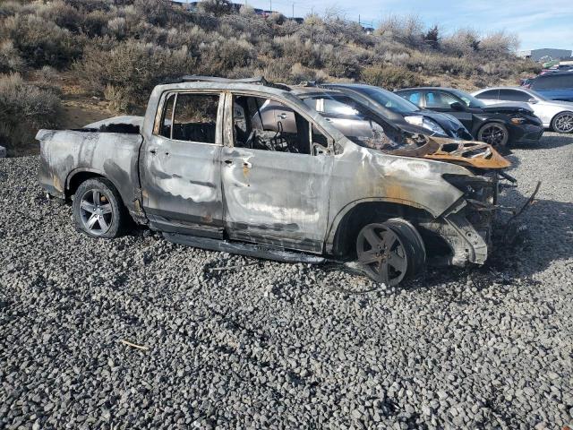 Photo 4 from auction – 2022 HONDA RIDGELINE with VIN 5FPYK3F74NB010596