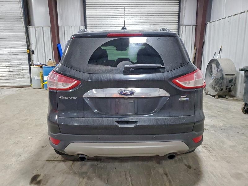 Photo 6 from auction – 2014 FORD ESCAPE SE with VIN 1FMCU9G97EUC06227