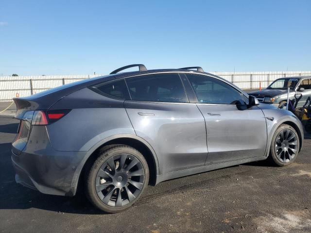 Photo 3 from auction – 2021 TESLA MODEL Y with VIN 5YJYGDEE9MF076768