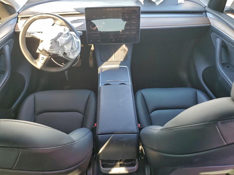 Photo 8 from auction – 2023 TESLA MODEL Y with VIN 7SAYGDEE2PA102020