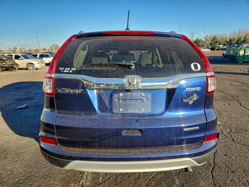 Photo 6 from auction – 2015 HONDA CR-V TOURI with VIN 5J6RM4H95FL124434
