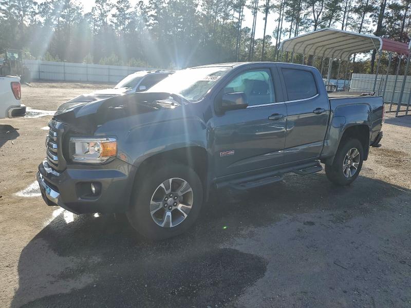 GMC CANYON SLE 2015 with VIN 1GTG6BE33F1177950 - Photo from auction