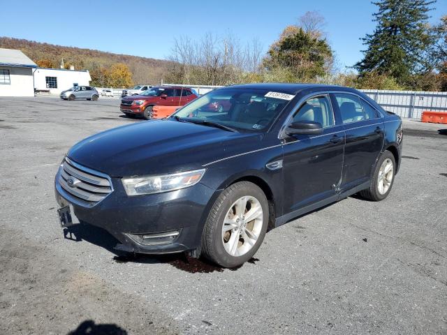 FORD TAURUS SEL 2014 with VIN 1FAHP2H86EG173501 - Photo from auction