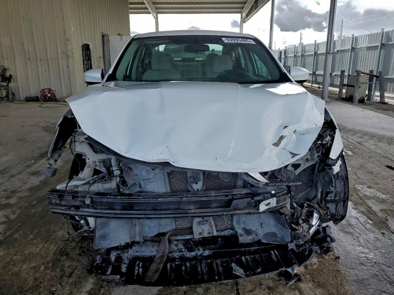 Photo 5 from auction – 2016 NISSAN SENTRA S with VIN 3N1AB7AP9GL660377