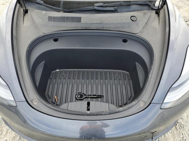 Photo 11 from auction – 2022 TESLA MODEL 3 with VIN 5YJ3E1EB0NF350851