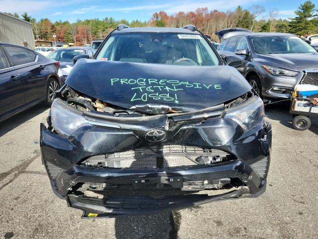 Photo 5 from auction – 2018 TOYOTA RAV4 LE with VIN 2T3ZFREV6JW434807