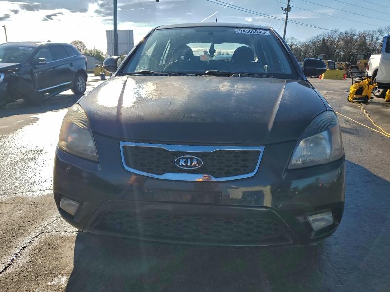 Photo 5 from auction – 2011 KIA RIO BASE with VIN KNADH5A39B6767715