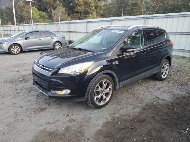 FORD ESCAPE TIT 2016 with VIN 1FMCU0JX9GUC85728 - Photo from auction