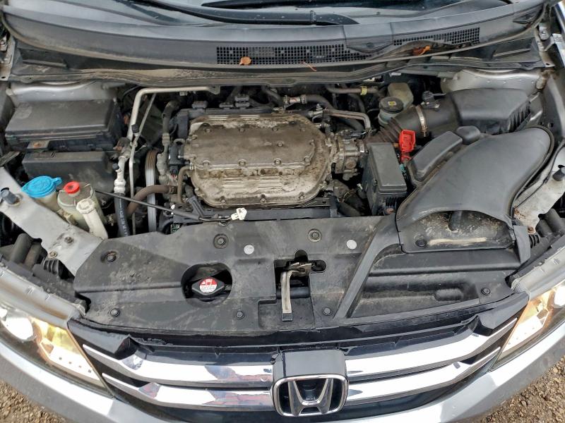 Photo 12 from auction – 2016 HONDA ODYSSEY SE with VIN 5FNRL5H33GB145328