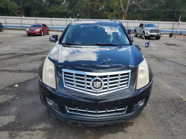 Снимка 5 от търг – 2013 CADILLAC SRX PERFOR с VIN 3GYFNDE30DS591994