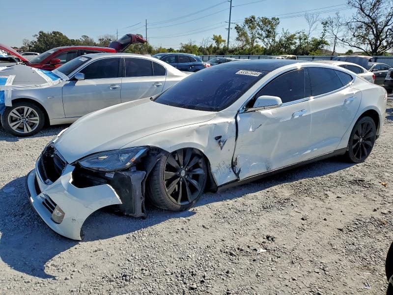 TESLA MODEL S 2013 with VIN 5YJSA1CP2DFP19990 - Photo from auction