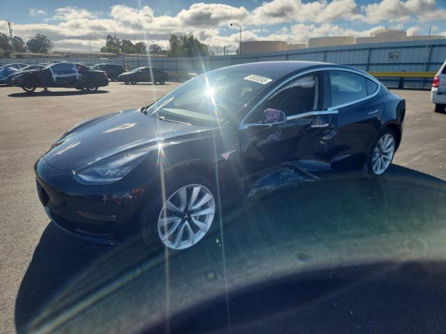 TESLA MODEL 3 2018 with VIN 5YJ3E1EA3JF010692 - Photo from auction