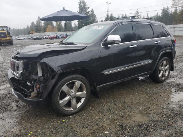 JEEP GRAND CHER 2011 with VIN 1J4RR5GG7BC528577 - Photo from auction