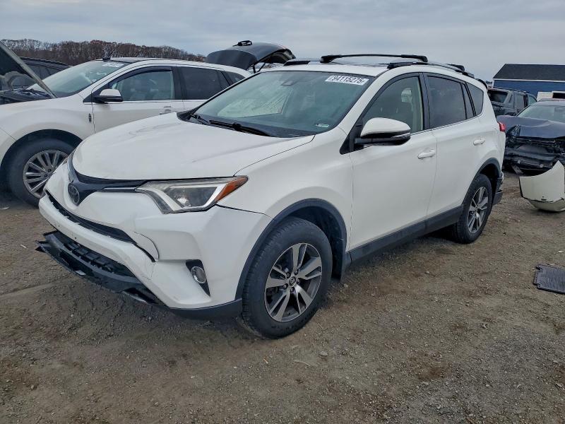 TOYOTA RAV4 XLE 2017 with VIN JTMRFREV7HJ131690 - Photo from auction