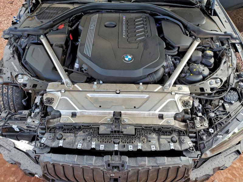Photo 11 from auction – 2022 BMW M440I with VIN WBA53AT06NCH99416