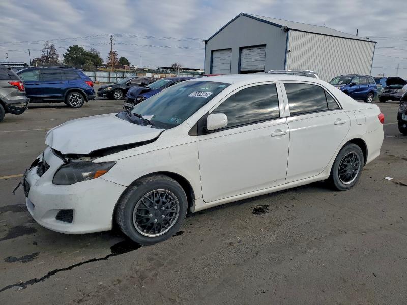 TOYOTA COROLLA 2010 with VIN 2T1BU4EE7AC392815 - Photo from auction