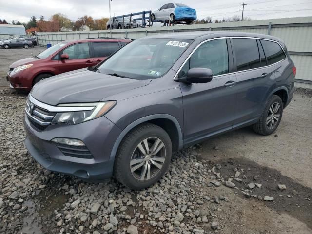 HONDA PILOT EX 2017 with VIN 5FNYF6H35HB036184 - Photo from auction