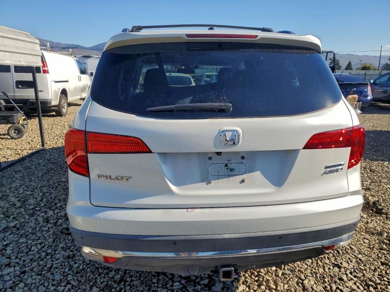 Photo 6 from auction – 2017 HONDA PILOT TOUR with VIN 5FNYF6H98HB012675