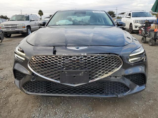 Photo 5 from auction – 2022 GENESIS G70 BASE with VIN KMTG34TA7NU099757