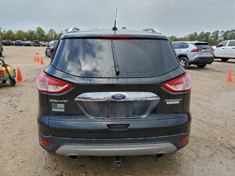 Photo 6 from auction – 2015 FORD ESCAPE TIT with VIN 1FMCU0J90FUB31179