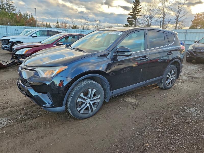TOYOTA RAV4 LE 2016 with VIN 2T3BFREV4GW459523 - Photo from auction
