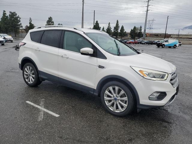 Photo 4 from auction – 2017 FORD ESCAPE TIT with VIN 1FMCU0J95HUD77115
