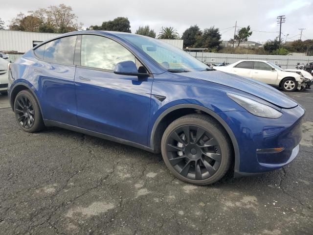 Photo 4 from auction – 2023 TESLA MODEL Y with VIN 7SAYGAEE0PF697080