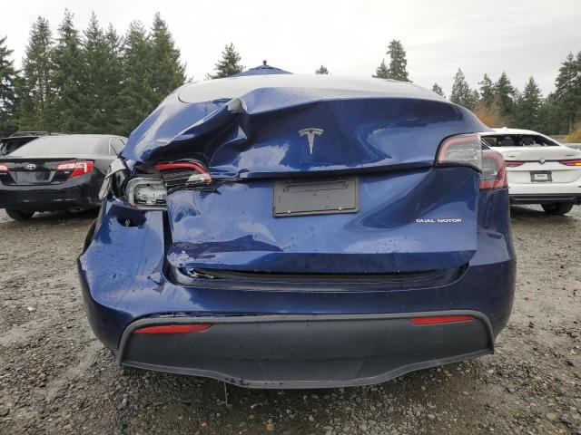 Photo 6 from auction – 2023 TESLA MODEL Y with VIN 7SAYGDEE1PF810049