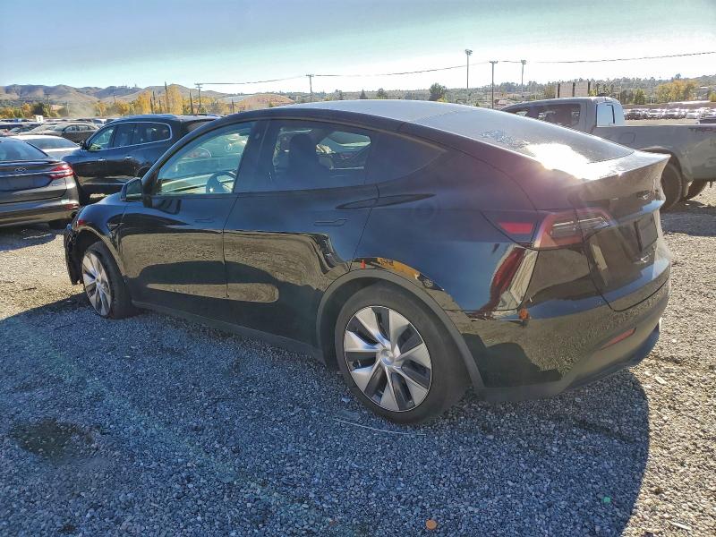 Photo 2 from auction – 2023 TESLA MODEL Y with VIN 7SAYGAEE7PF621825