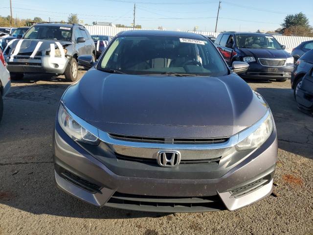 Photo 5 from auction – 2018 HONDA CIVIC EX with VIN 2HGFC2F77JH605410
