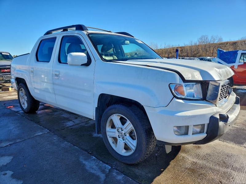 Photo 4 from auction – 2014 HONDA RIDGELINE with VIN 5FPYK1F54EB003425