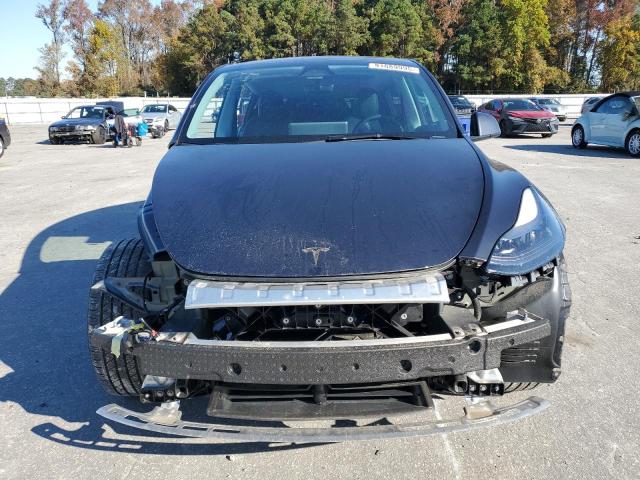 Photo 5 from auction – 2025 TESLA MODEL Y with VIN 7SAYGDEE2SA354312