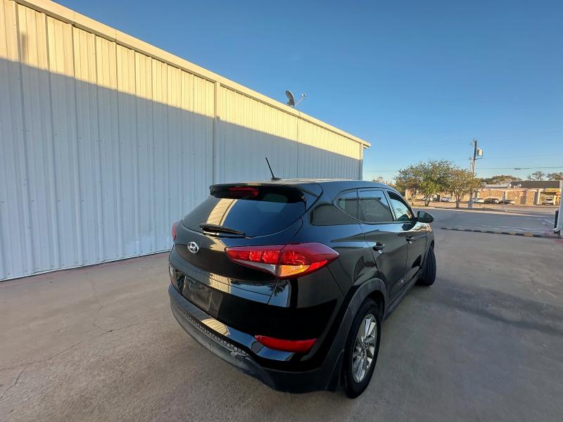 Photo 4 from auction – 2016 HYUNDAI TUCSON SE with VIN KM8J23A44GU164979