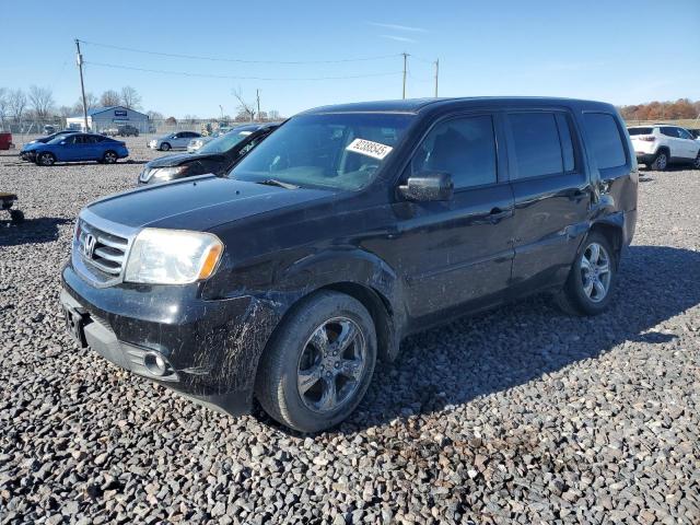HONDA PILOT EXL 2012 with VIN 5FNYF4H53CB041169 - Photo from auction