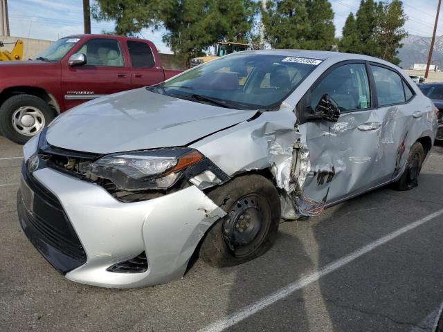 TOYOTA COROLLA L 2017 with VIN 5YFBURHEXHP628313 - Photo from auction