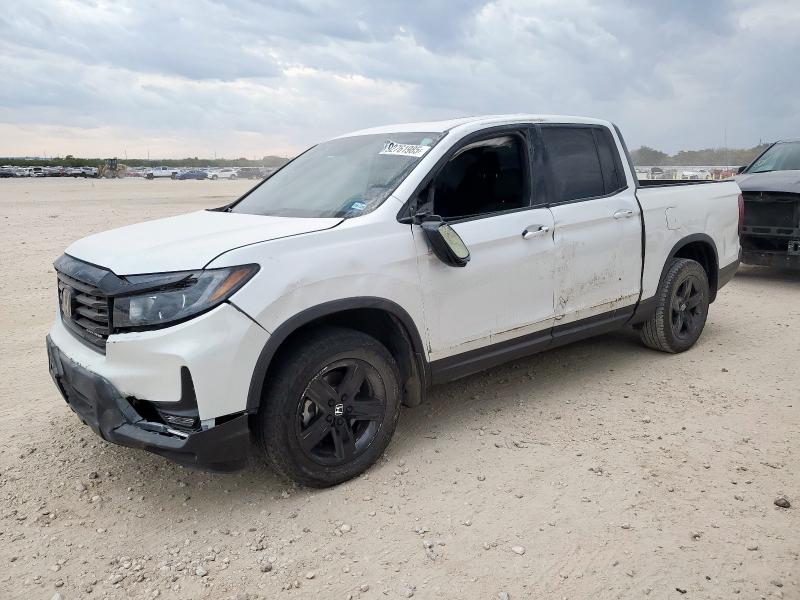 HONDA RIDGELINE 2023 with VIN 5FPYK3F89PB034615 - Photo from auction