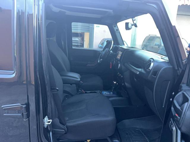 Photo 5 from auction – 2015 JEEP WRANGLER U with VIN 1C4BJWDG6FL558863