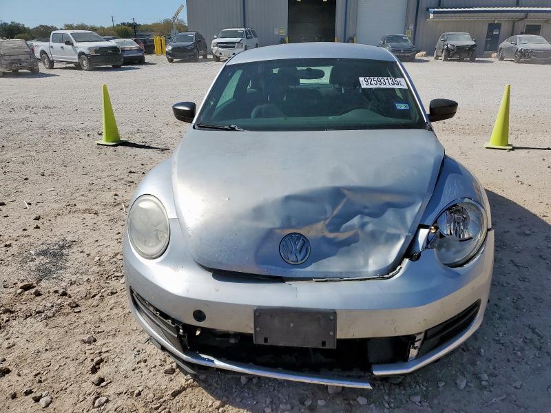 Photo 5 from auction – 2014 VOLKSWAGEN BEETLE with VIN 3VWFP7AT7EM623348