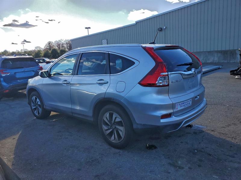 Photo 2 from auction – 2016 HONDA CR-V TOURI with VIN 5J6RM4H91GL062967