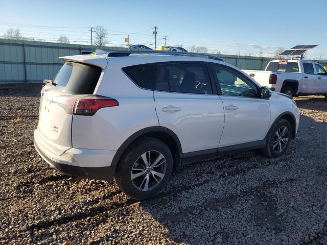 Photo 3 from auction – 2017 TOYOTA RAV4 XLE with VIN JTMRFREV7HJ140342
