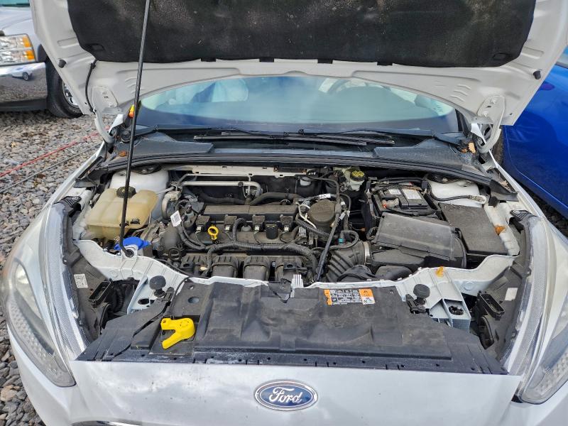 Photo 11 from auction – 2016 FORD FOCUS SE with VIN 1FADP3K29GL213511