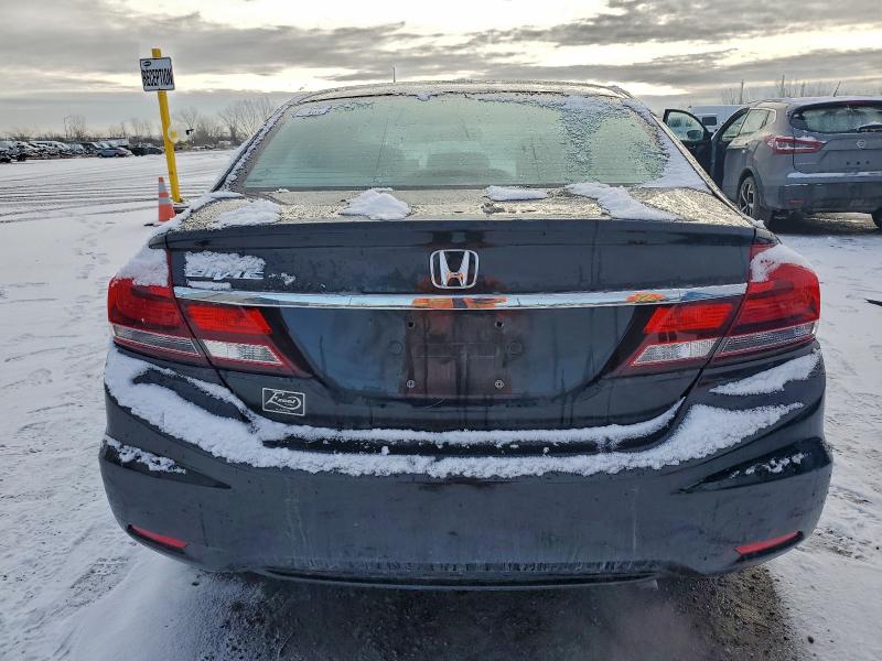 Photo 6 from auction – 2013 HONDA CIVIC LX with VIN 2HGFB2F43DH020529