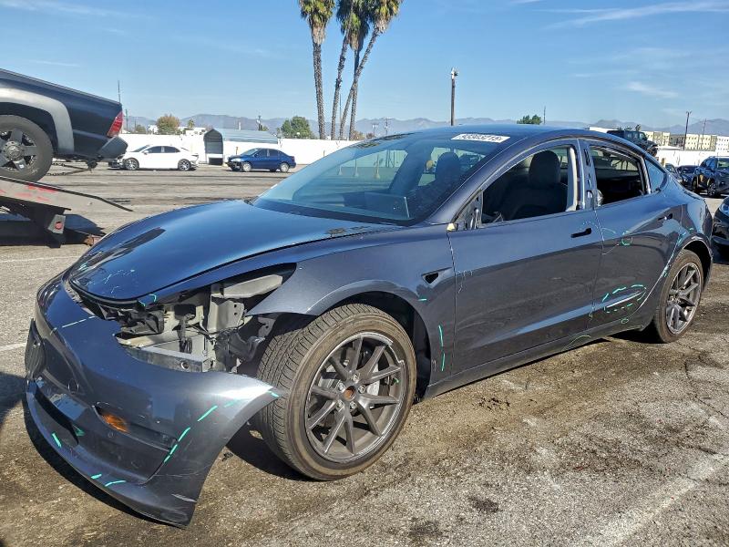TESLA MODEL 3 2021 with VIN 5YJ3E1EA6MF058997 - Photo from auction